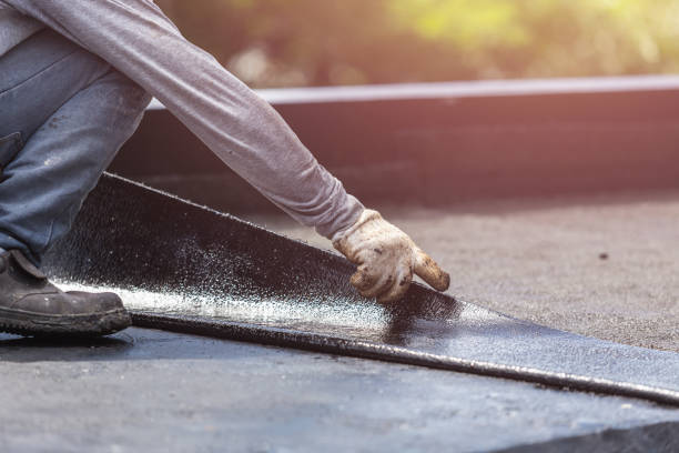 Professional Basement Waterproofing technician working in Caruthersville, MO